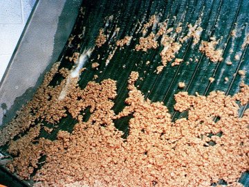 Closeup of solids capture with Hydroscreen Solids Liquid Separation Screen